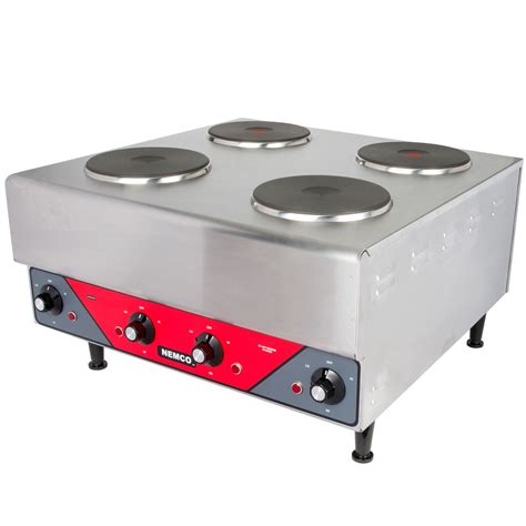 electric stove with raised burners.